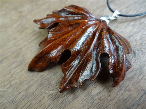 wood carved maple leaf pendant hand carved wooden pendant etsy