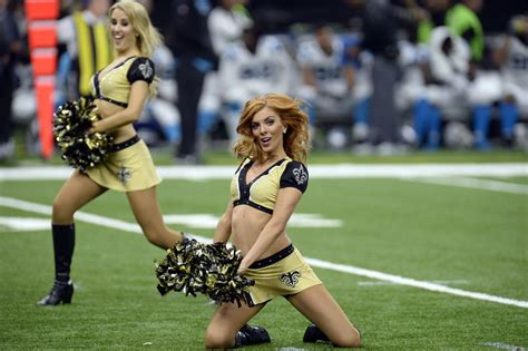 nfl cheerleader says new orleans saints fired her over racy photo