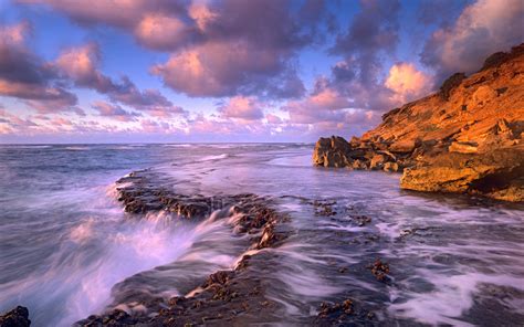 ocean waves hitting  rocks beautiful pictures photo