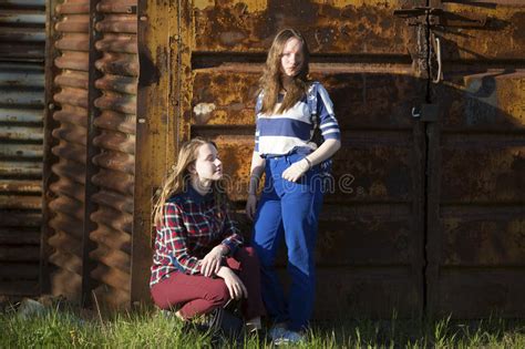 two beautiful teenage girls on the background stock image