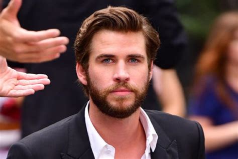 Off The Market Liam Hemsworth Goes Public With New