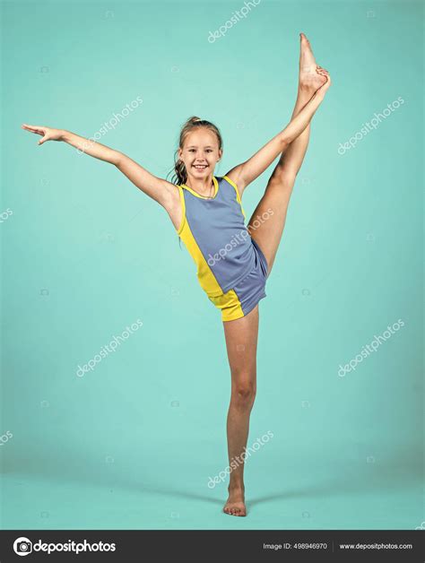 Teen Girl Wear Sportswear For Training Gymnast In Split Sport Stock