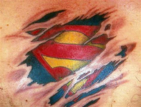 ripping through skin tattoos superman symbol ripping skin worst