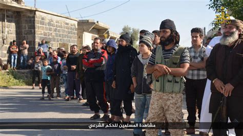 graphic photos islamic state beheads man accused of