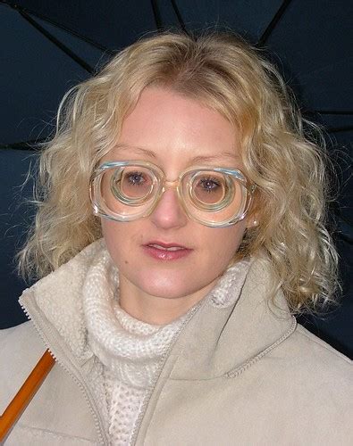 laet cute blonde girl with big strong glasses laet