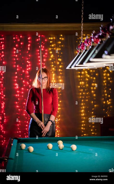 Billiard Club A Woman With In Glasses With Red Hair And Nice Figure