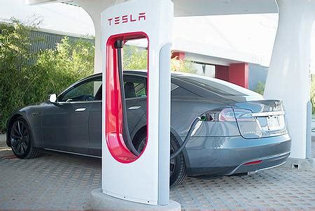 tesla electric cars aim  compete  petroleum fueled   ultra fast battery charging
