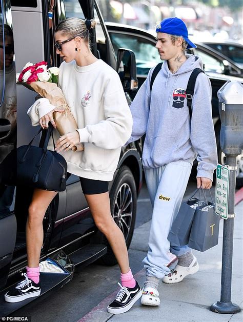 hailey bieber beams as she continues her luxurious valentine s day with
