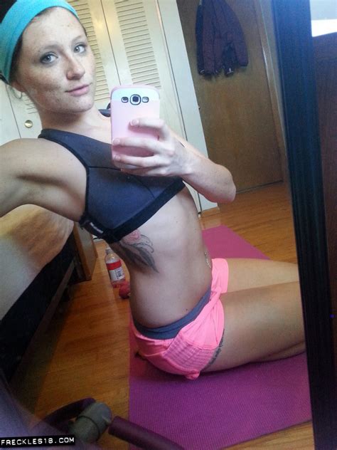 pierced amateur freckles takes self shot posing in shorts and sexy panties