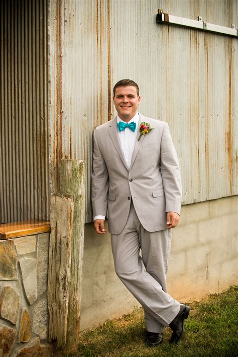 light gray suit  teal bow tie