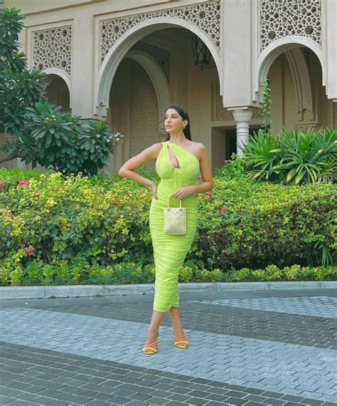Nora Fatehi Flaunts Hourglass Figure In Neon Green Bodycon Dress Check