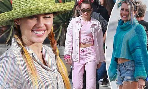 miley cyrus rocks three outfits while filming commercial daily mail