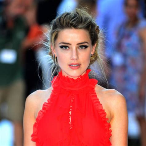 Amber Heard ‘happily Signing Her Autograph In New Home Of Madrid Amid