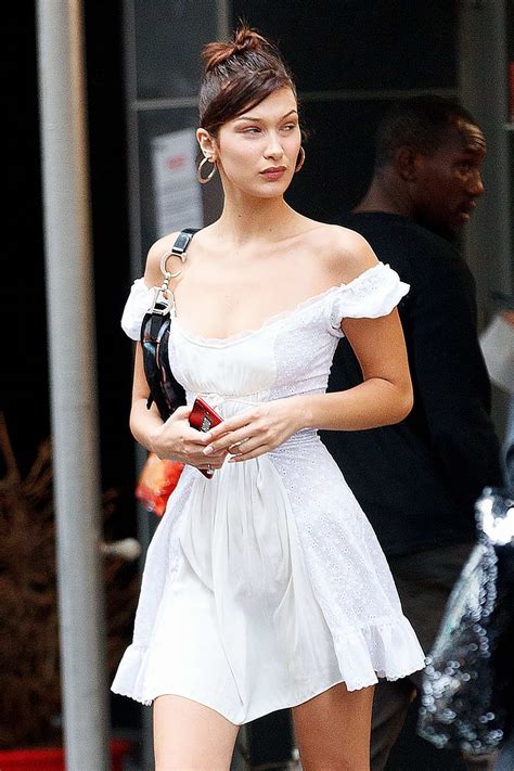 Bella Hadid Wears A White Dress Paired With Knee High