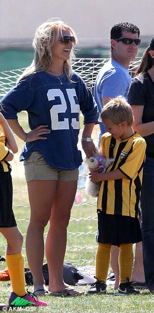 britney spears shows her spirit in a jersey top paired with tiny shorts