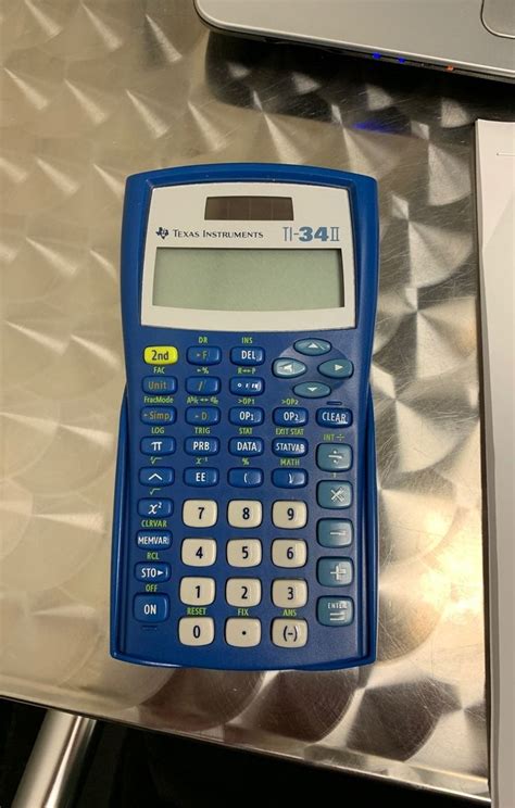 ti  ii calculator  great working condition  questions feel    cover included