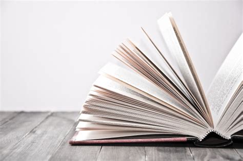 open book  raised leaves  photo