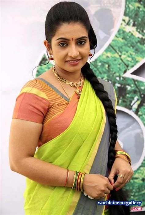 telugu tv actress sujitha stills in yellow saree