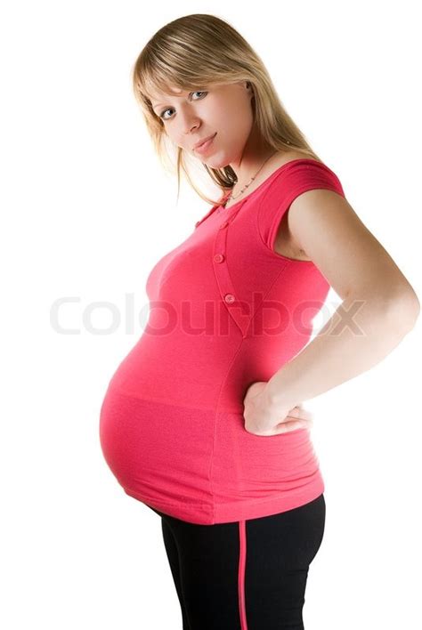 caucasian woman is 9 months pregnant stock image
