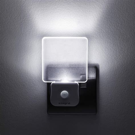 integral led motion sensor night light plug  wall  dusk  dawn photocell sensor