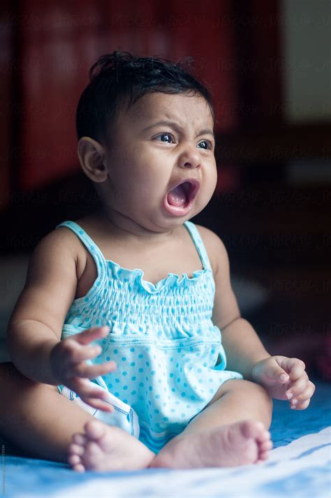 cute baby girl crying  stocksy contributor saptak ganguly stocksy