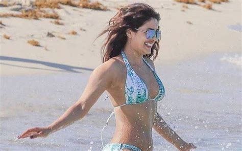 see pics priyanka chopra goes into baywatch mode burns up the beach in a bikini celebrities