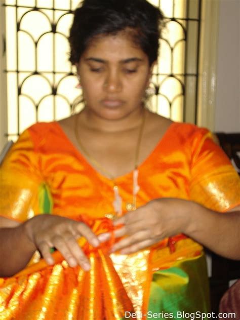 Indian Tamil Mature Aunty In Golden Sari Looking Sexy