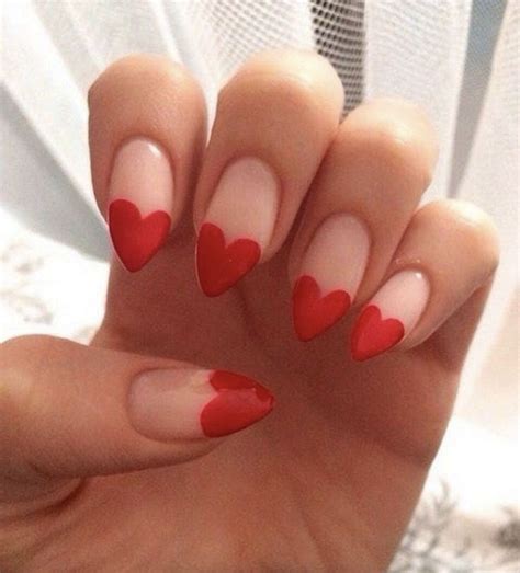 red heart tips   almond rounded shape nails red heart inspo valentinesday