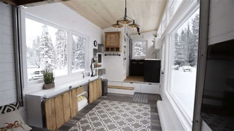 open concept tiny house  packed  inventive space saving features
