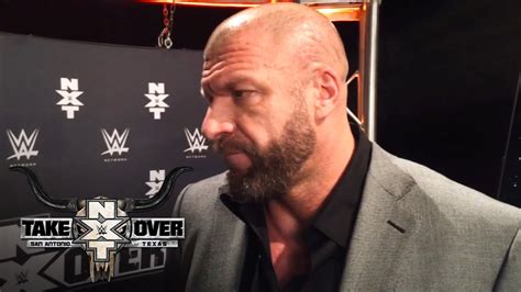triple h responds to seth rollins takeover invasion