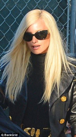 penelope cruz sports blonde wig for donatella versace role