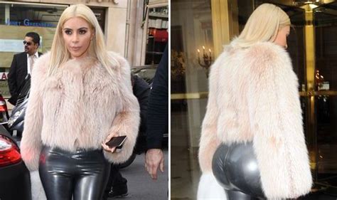 kim kardashian flaunts her famous derriere in a pair of pvc leggings celebrity news showbiz
