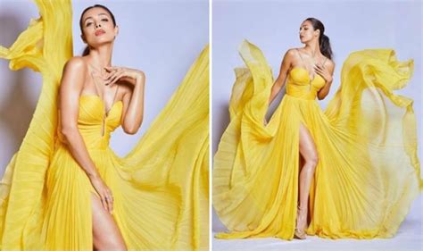 Malaika Arora Looks Sizzling Hot In Thigh High Slit Yellow Dress As She