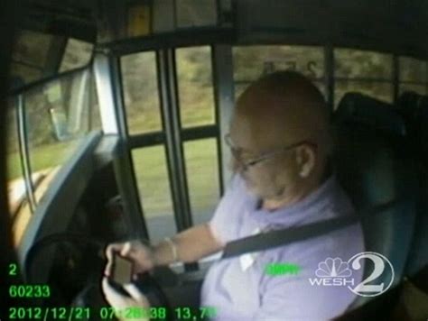 look no hands school bus driver caught on camera texting while driving without even holding the