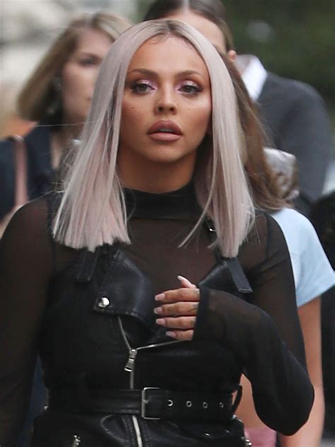 jesy nelson flashes bra in see through top and pvc trousers