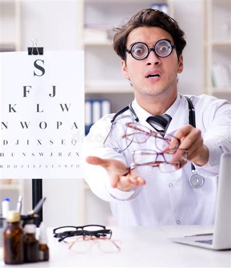 The Funny Eye Doctor In Humourous Medical Concept Stock Image Image
