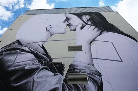 Artist Paints Massive Mural Of Lesbian Couple In Belfast To Highlight