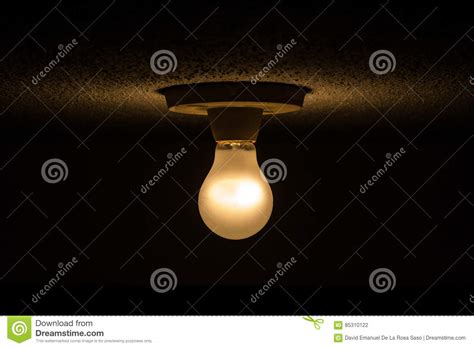light   middle  darkness stock photo image  lamp common