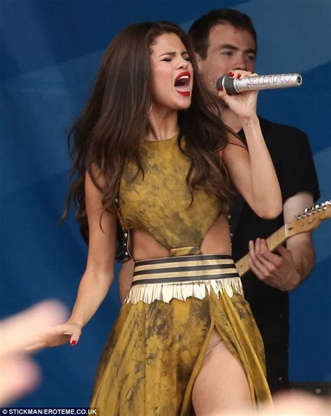 selena gomez exposes her flesh coloured underwear in a sexy cut out