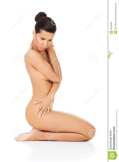 Attractive Naked Woman Sitting On Knees Side View