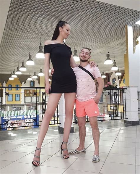 Ekaterina Lisina From Russia Next To An Average Male In
