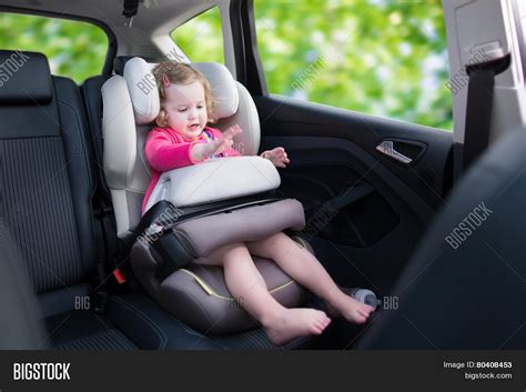 girl car seat image photo  trial bigstock
