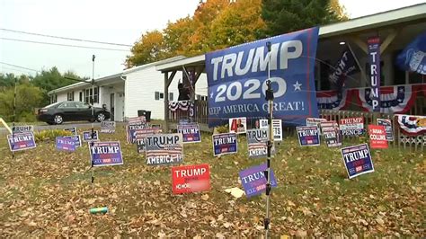 maine man builds huge trump  display guarded  electric fence  sign theft necn