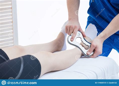 The Doctor Makes A Massage With The Blade Tool Increased