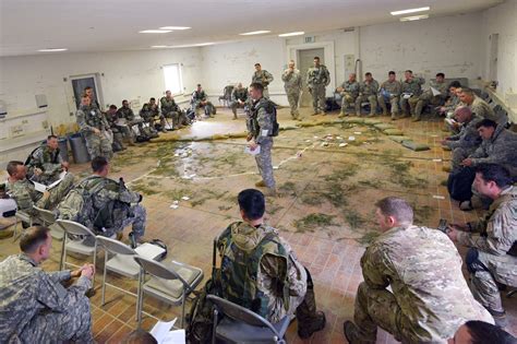 soldiers conduct  briefing   air assault mission