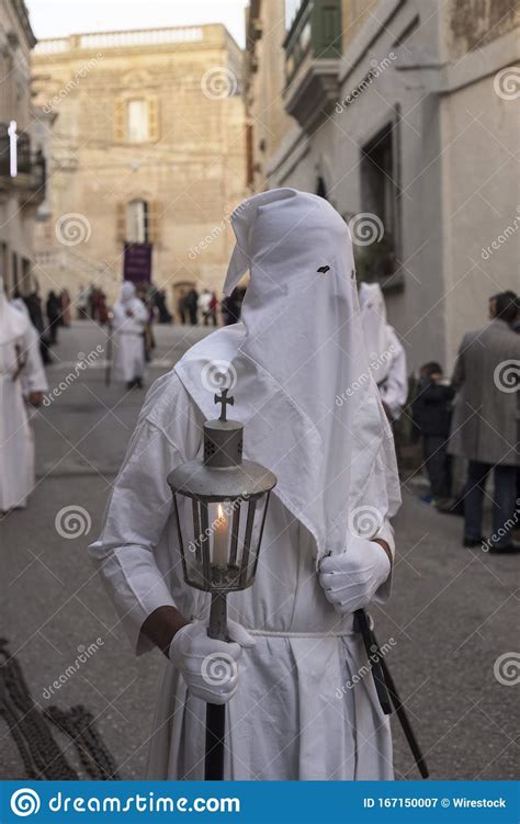 white robed hooded penitent good friday procession naxxar malta