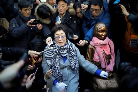 s koreans march with coffin in comfort women protest at