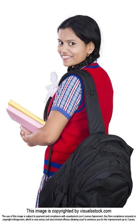 indian government school girl student holding book  bag turning