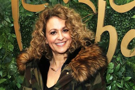 nadia sawalha poses naked in her garden with a tub of