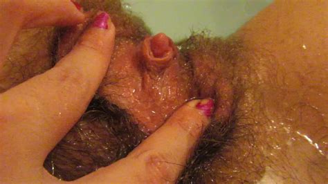 big clit hairy pussy girl masturbating in the bathtub